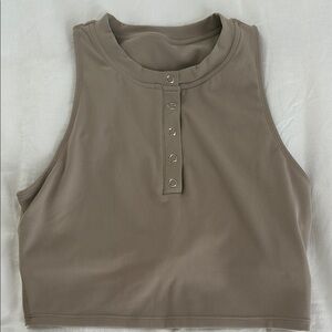 Ptula Athletic Henley Crop Top. Tan